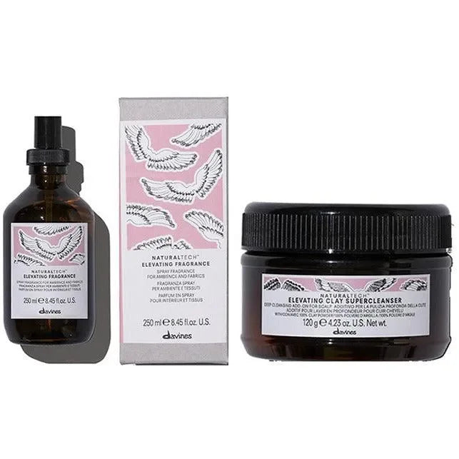 Davines Naturaltech Elevating Clay Supercleanser jar and Elevating Fragrance bottle with box, both with pink wing designs.