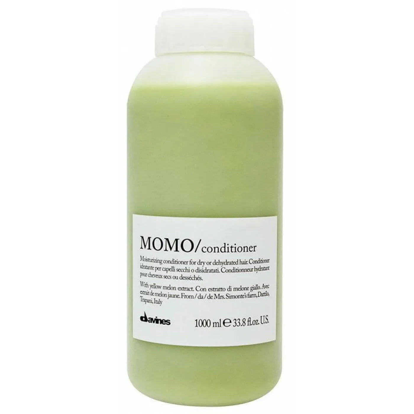 Large bottle of MOMO conditioner for dry or dehydrated hair, labeled with white text.