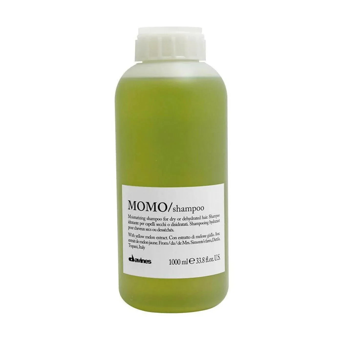 Large green bottle of MOMO moisturizing shampoo for dry or dehydrated hair, 1000 ml