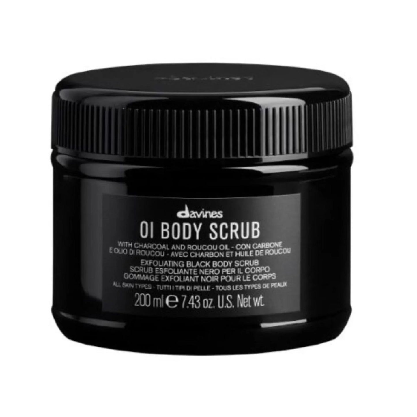 Black jar of OI Body Scrub exfoliating body care with charcoal and roucou oil, 200ml