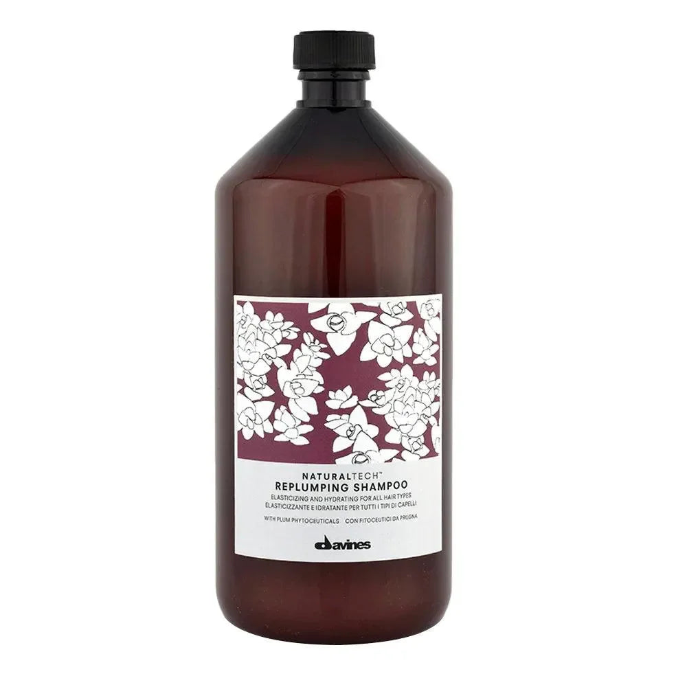 Davines Naturaltech Replumping Shampoo bottle for all hair types with floral label