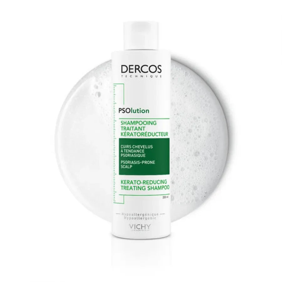 Vichy Dercos PSOlution kerato-reducing shampoo bottle with white foam background