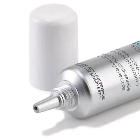 Anti-wrinkle eye cream tube with silver applicator and white cap on white background