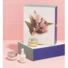 Comfort Zone Sacred Nature skincare set with cream, serum, and box on a pink background, Goldfarmaci.