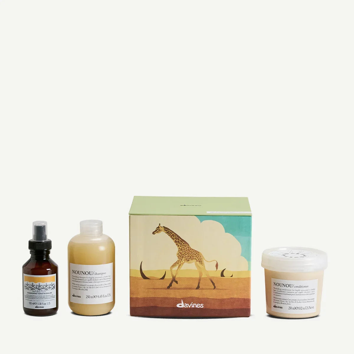 Davines Radiant Savanna haircare set with giraffe box, shampoo, conditioner, and spray