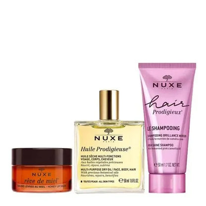 Nuxe The Iconics skincare and haircare set with lip balm, dry oil, and shampoo, Goldfarmaci