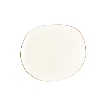 A small amount of clear Goldfarmaci organic chia seed oil on a white plate