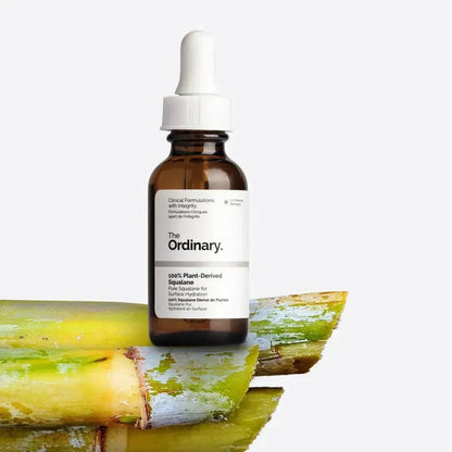 The Ordinary 100% Plant-Derived Squalane serum bottle on sugarcane, dermocosmetic skincare at Goldfarmaci Albania